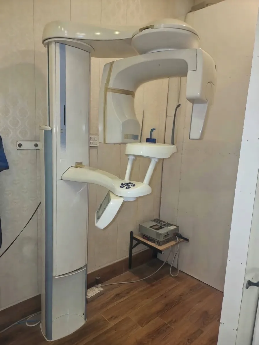 Panoramic dental X-ray (OPG) machine in a dedicated room at Al-Rehman Dental Care
